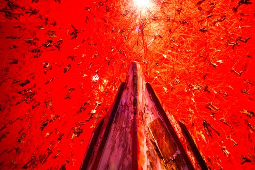 VENICE, ITALY - MAY 06: "The Key in the Hand" installation by Chiharu Shiota in the Japan National Pavilion at the 56 th Art exhibition of Venice biennale on May 06, 2015