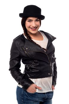 Young woman posing with leather jacket over white