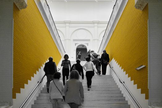 Amsterdam, Netherlands - May 6, 2015: People visit Stedelijk Museum in Amsterdam located in the museum park, Netherlands on May 6, 2015