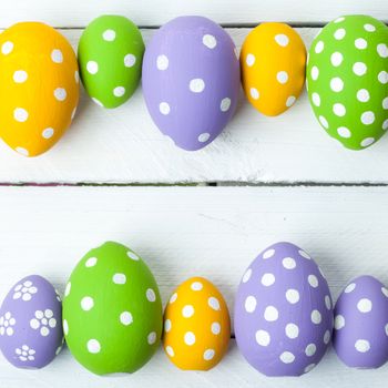 Colorful easter eggs, with space for text. Background