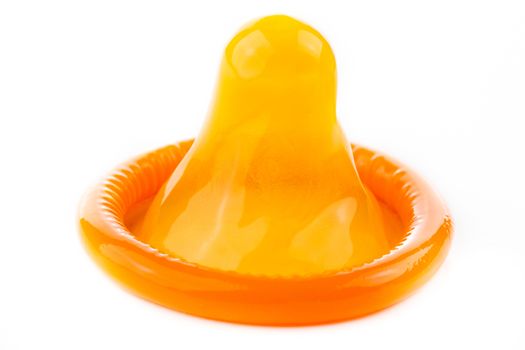 orange condom on white background