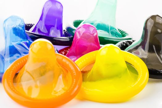 colorful condom on white background