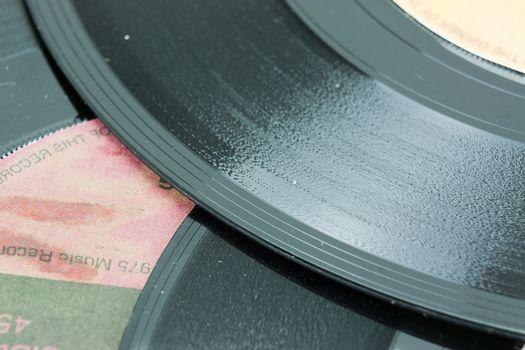 Close up of old vinyl single records