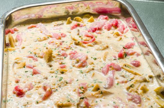 Stroganoff with mushrooms raw, in baking dish