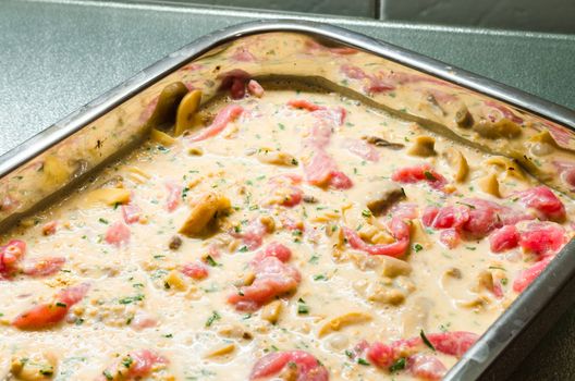 Stroganoff with mushrooms raw, in baking dish