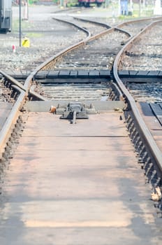 Glance on rails. Railway line crossing 