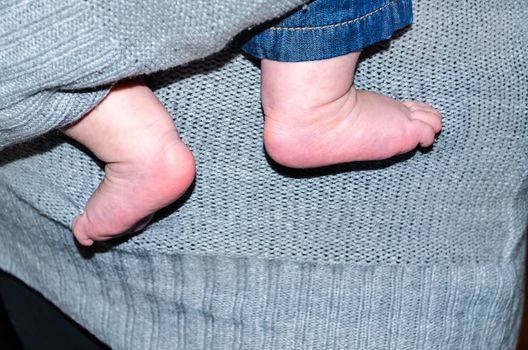 Close-up, feet of a newborn baby.