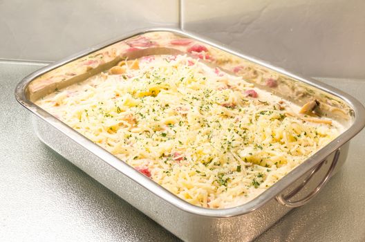 Stroganoff with mushrooms raw, in baking dish