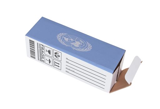 Concept of export, opened paper box - Product of the United Nations