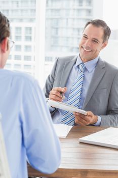 Businessmen working together in an office