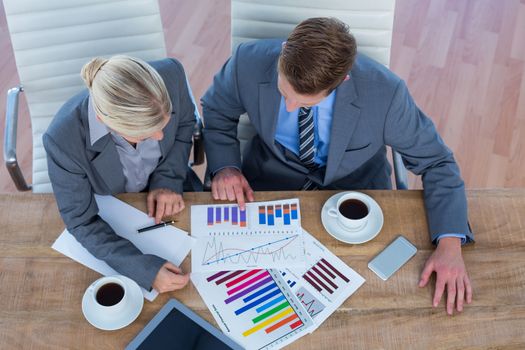 Business people brainstorming together in an office