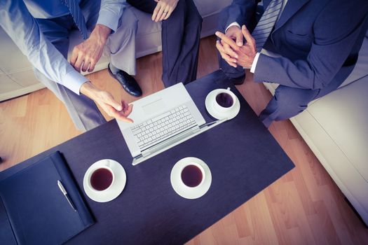 Business people having a meeting at desk in the office