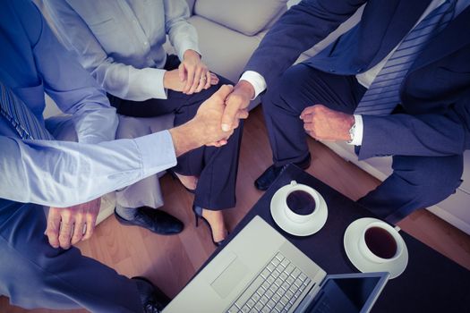 Business people having a meeting at desk in the office