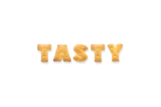 Collage of the capital letters word TASTY. Alphabet cookie biscuits isolated on white background