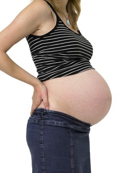 Pregnant woman, showing her belly, in profile