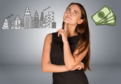 Beautiful business woman thinking over money and buildings. Gray gradient background