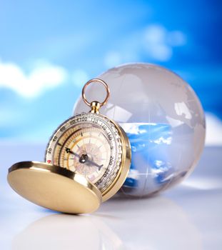 Old compass on modern bright background
