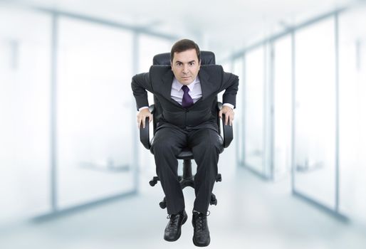 young businessman on a chair at the office