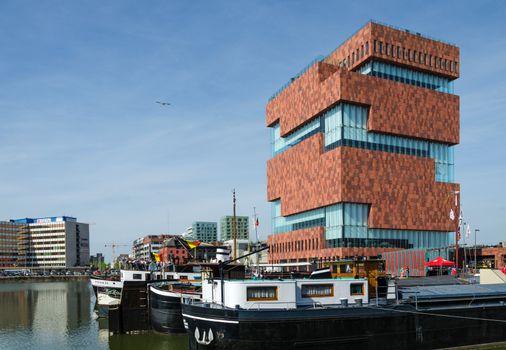 Antwerp, Belgium - May 10, 2015: Museum aan de Stroom (MAS) along the river Scheldt in the Eilandje district of Antwerp, Belgium, on May 10, 2015. Opened in May 2011, is the largest museum in Antwerp.