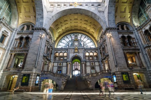 Antwerp, Belgium - May 11, 2015: People in Entrance hall of Antwerp Central station on May 11, 2015 in Antwerp, Belgium. The station is now widely regarded as the finest example of railway architecture in Belgium.