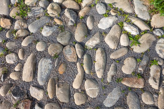 River rough stones pavement background