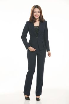 Young Asian women wearing a suit in front of a white background