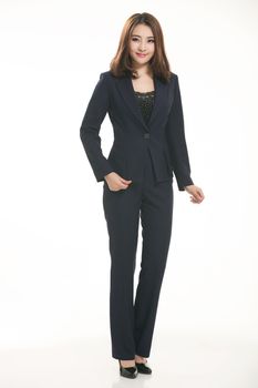 Young Asian women wearing a suit in front of a white background