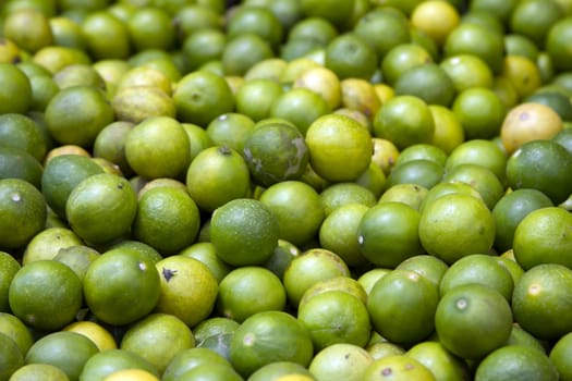 Fresh juicy lime on a counter in the market of India of Goa.