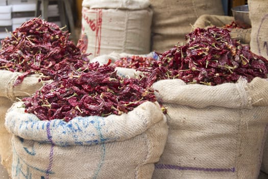 Dried red chili peppers in sacks in India Goa.