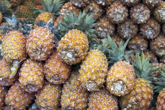 Fresh juicy pineapple on the market in India Goa.