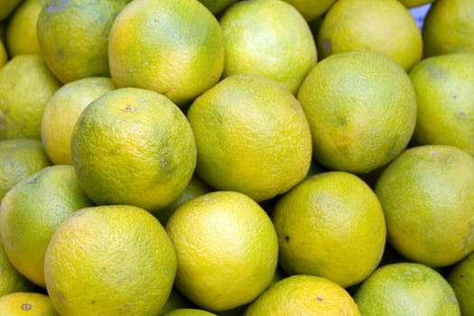 Fresh juicy lime on a counter in the market of India of Goa.