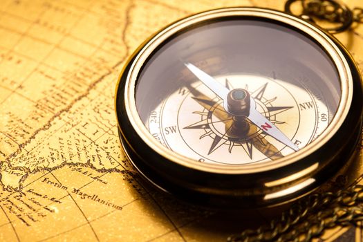 Compass on the old paper background