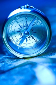Compass on the old paper background