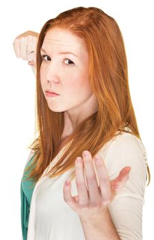 Isolated woman with threatening expression and clenched fist