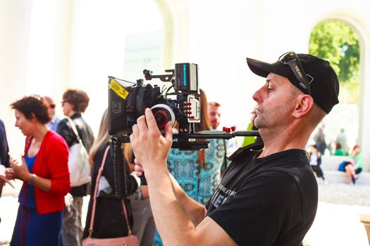 VENICE, ITALY - MAY 06: Cameraman in action during the 56th Venice Biennale on May 06, 2015