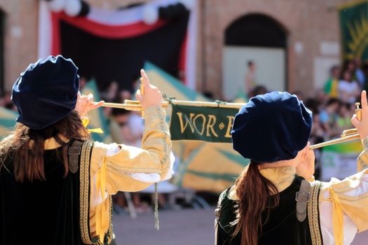 Palio, the city celebrates with competitions of the flag wavers and the parade of the districts