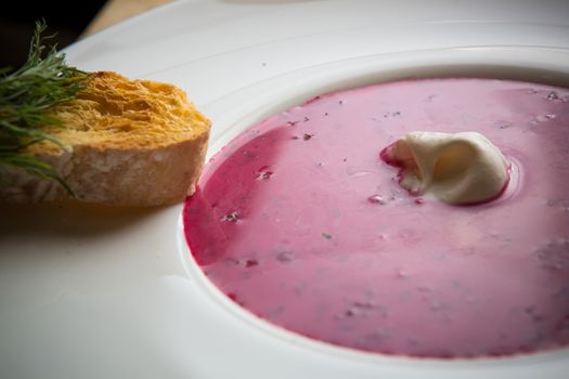 Cold summer Beets soup in white plate