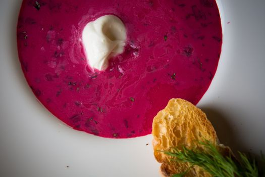 Cold summer Beets soup in white plate