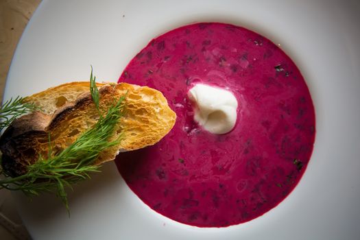 Cold summer Beets soup in white plate