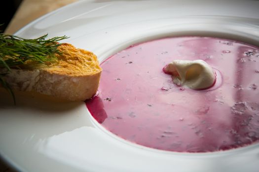 Cold summer Beets soup in white plate
