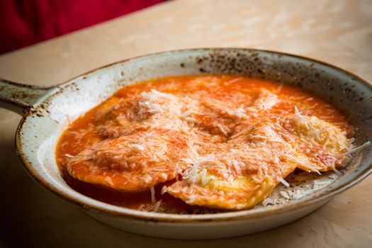 Ravioli in sauce. Lunch. Ravioli Medallions with Marinara Sauce.