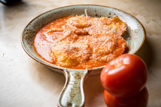 Ravioli in sauce. Lunch. Ravioli Medallions with Marinara Sauce.