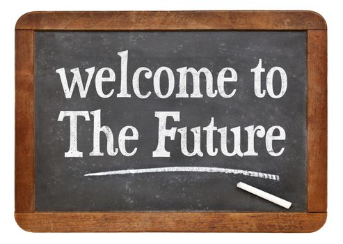 Welcome to the future - text  on a vintage slate blackboard