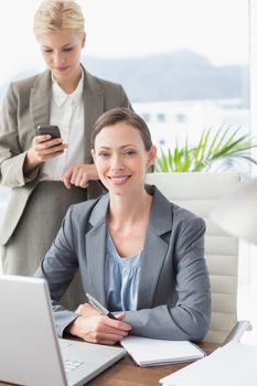 Businesswomen working together in an office