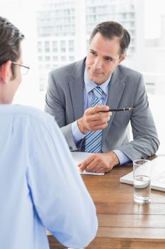 Businessmen working together in an office