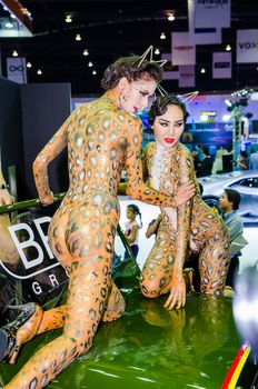 NONTHABURI - MARCH 24: BRG group with Unidentified model is body paint on display at Thailand 36th Bangkok International Motor Show 2015 on March 24, 2015 in Nonthaburi, Thailand.