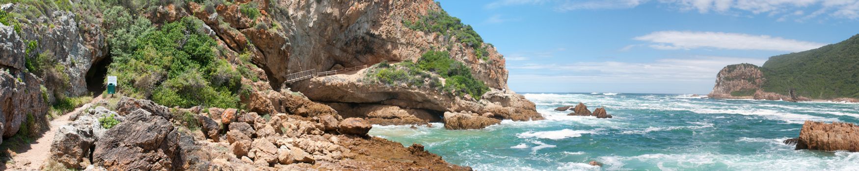 KNYSNA, SOUTH AFRICA - JANUARY 5, 2015: Panorama of anglers at The Heads in Knysna where the lagoon enters the sea