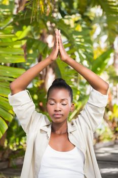 A young woman doing yoga over white backgroung