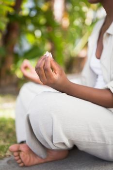 A young woman doing yoga over white backgroung 