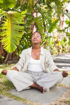 A young woman doing yoga over white backgroung